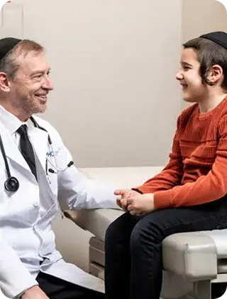Doctor Consulting a Child