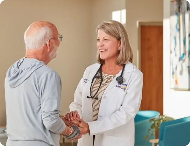 Medical Staff Treating an Elder Patient